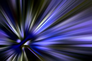 Starburst with radial blur and much blue and violet, for concepts of energy, radiation, and cosmic mystery